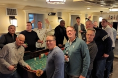 Powers Capital Management at Brittingham's Pub 2022 - Learning to play craps