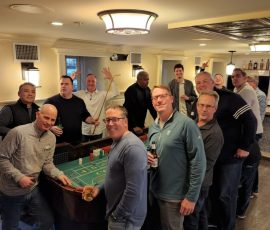 Powers Capital Management at Brittingham's Pub 2022 - Learning to play craps